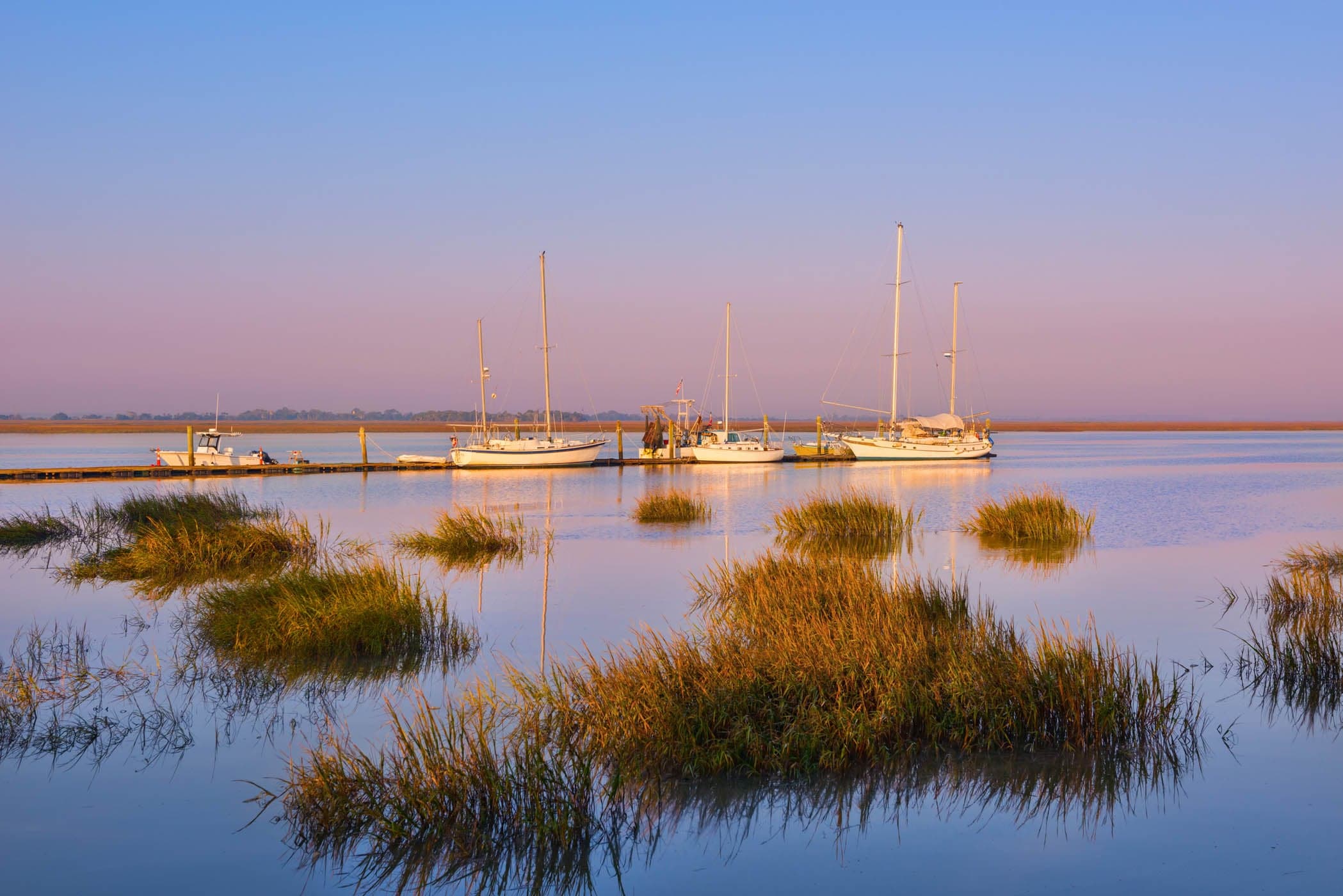 4 boats docked near JICR