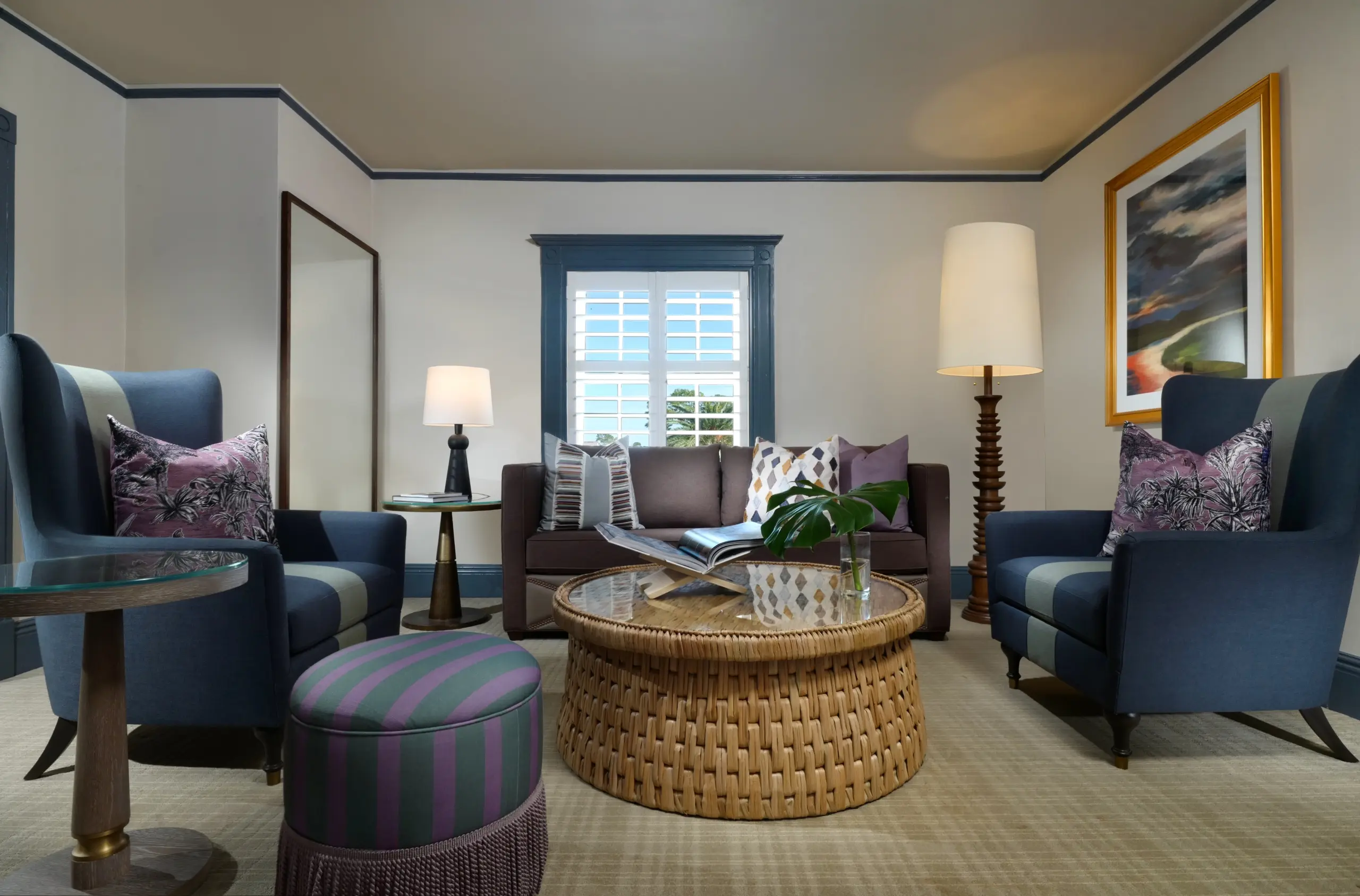 A living room in a Clubhouse Deluxe Two Queen Suite