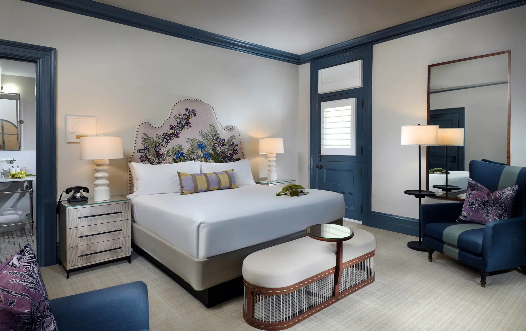 Deluxe King Clubhouse room with 2 lounge chair and access to a patio